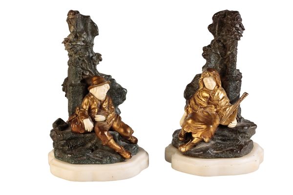 JEAN GARNIER (1853 - 1910) : A PAIR OF GILT BRONZE AND IVORY BOOKENDS