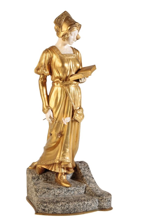 D. WATRIN: A GILT BRONZE AND IVORY SCULPTURE