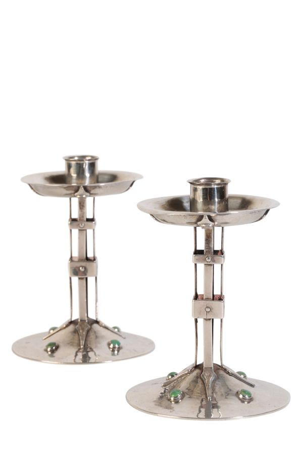 PAIR OF ARTS AND CRAFTS SILVER CANDLESTICKS