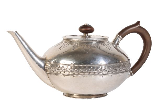 LIBERTY & CO: AN ARTS AND CRAFTS SILVER TEAPOT