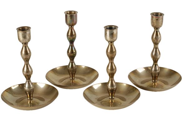 •SVEND WEIHRAUCH FOR FRANTZ HINGELBERG: A SET OF FOUR DANISH SILVER CANDLESTICKS