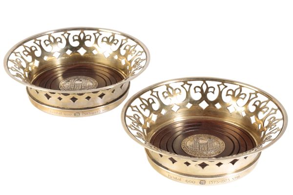 •ANTHONY ELSON: A PAIR OF COMMEMORATIVE LIMITED EDITION SILVER-GILT WINE COASTERS