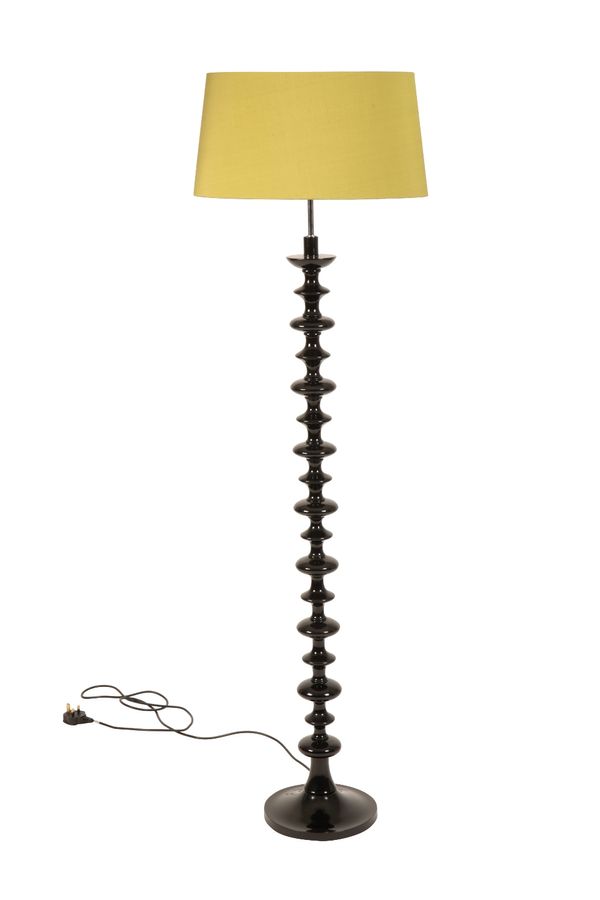 IN THE MANNER OF CHRISTOPHER GUY: A CONTEMPORARY BLACK LACQUERED STANDARD LAMP