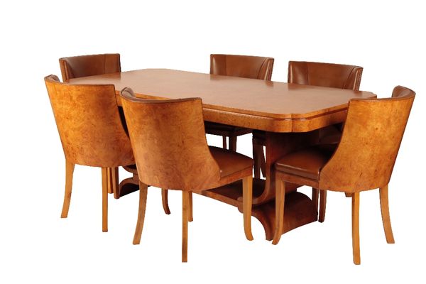HARRY AND LOU EPSTEIN: AN ART DECO BIRDS EYE MAPLE "CLOUD" DINING TABLE AND CHAIRS