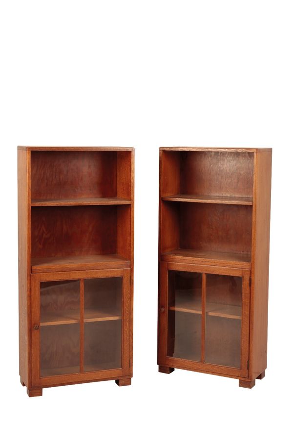 HEAL AND SONS: A PAIR OF OAK BOOKCASES