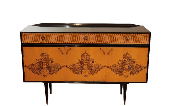 G.W. EVANS FOR ROBERT HERITAGE: AN EBONISED AND ASH CREDENZA
