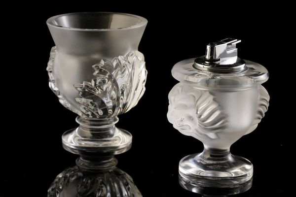LALIQUE: A "TETE DE LION" FROSTED AND CLEAR GLASS TABLE LIGHTER