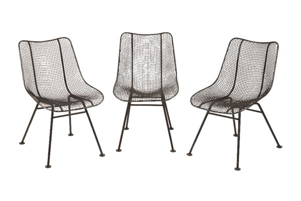 •RUSSELL WOODWARD: EIGHT BLACK IRONWORK DINING CHAIRS