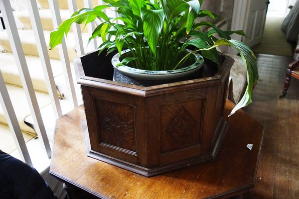 A 17TH CENTURY STYLE OCTAGONAL OAK JARDINIERE