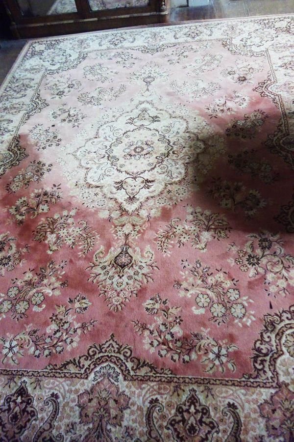 AN AXMINSTER TYPE PERSIAN STYLE CARPET