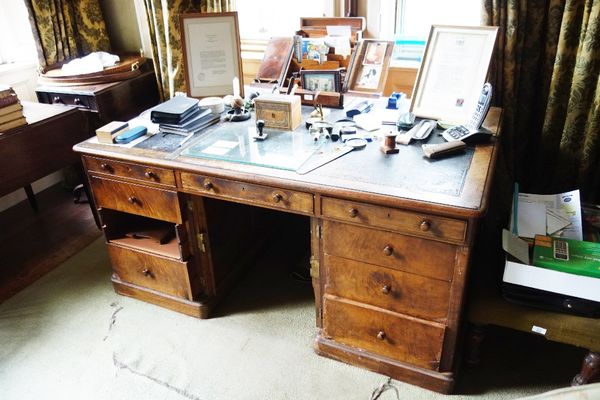 A VICTORIAN WALNUT PARTNER'S DESK