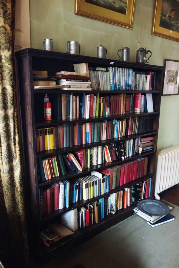 A SET OF STAINED SOFTWOOD BOOKSHELVES