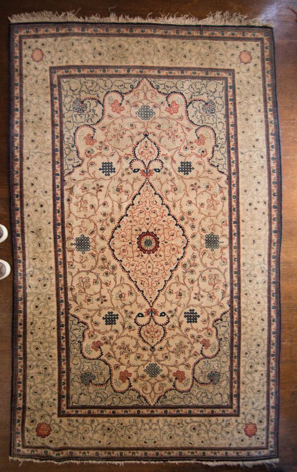 A FINE PERSIAN RUG