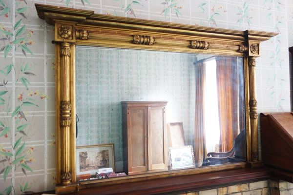 A LATE REGENCY GILTWOOD OVERMANTEL MIRROR