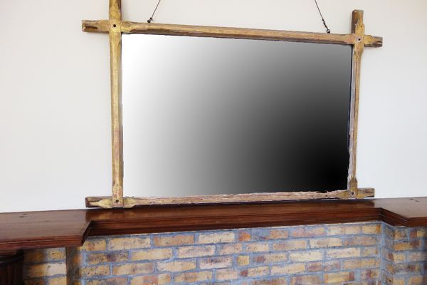 AN ARTS AND CRAFTS STYLE OAK DECORATED WALL MIRROR