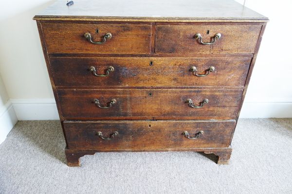 A 19TH CENTURY OAK CHEST OF DRAWERS