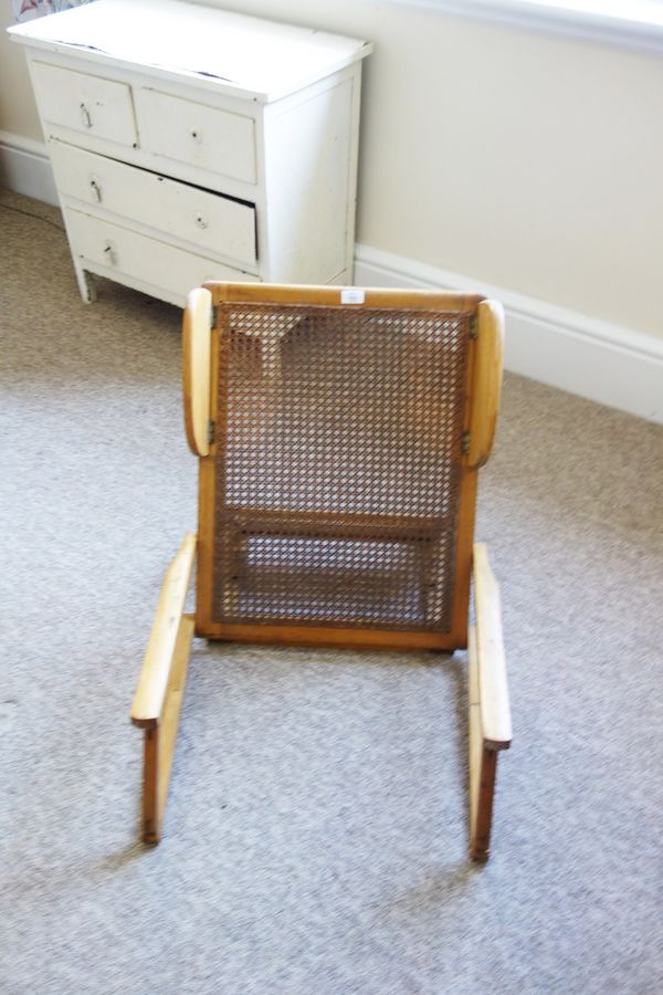 AN EDWARDIAN SATIN WALNUT BERGERE PANELLED ARTIST SEAT