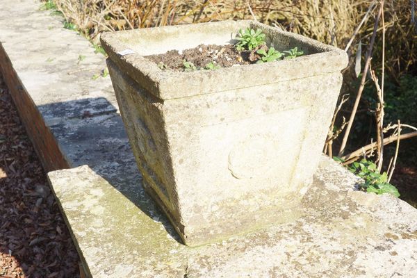 A SET OF EIGHT RECONSTITUTED STONE GARDEN PLANTERS