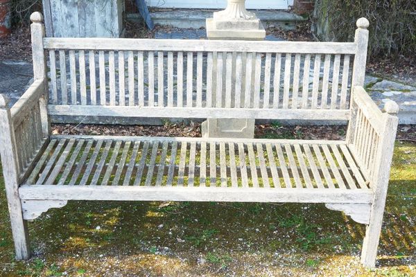 AN ARTS AND CRAFTS STYLE GARDEN BENCH