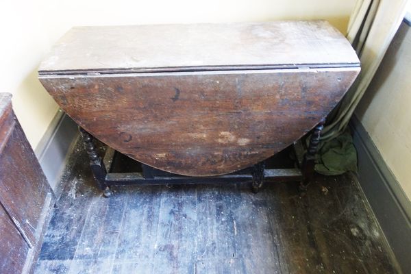 A CHARLES II STYLE OAK GATELEG TABLE