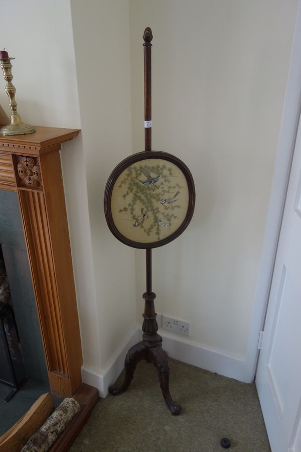 A LATE REGENCY MAHOGANY FIRESCREEN