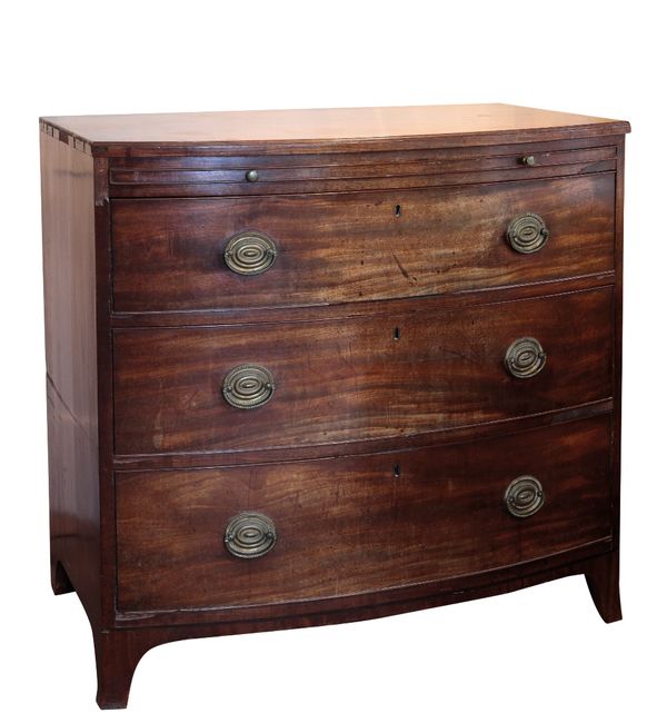A LATE GEORGE III MAHOGANY BOW FRONT CHEST OF DRAWERS
