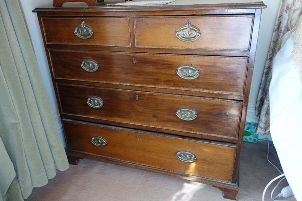 A LATE GEORGE III MAHOGANY CHEST OF DRAWERS
