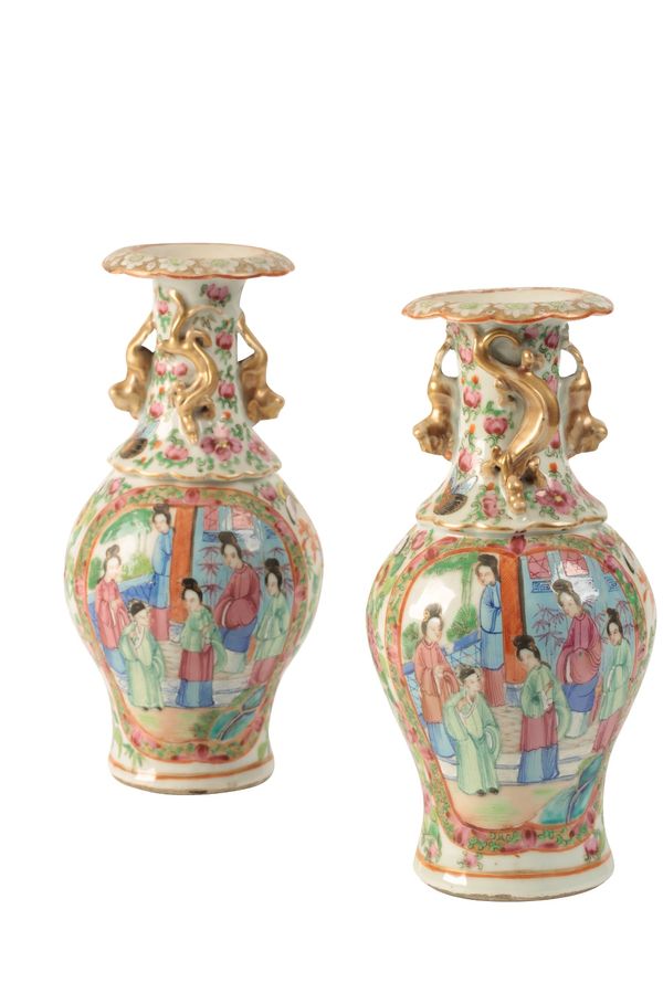 A PAIR OF CANTON FAMILLE ROSE BALUSTER VASES