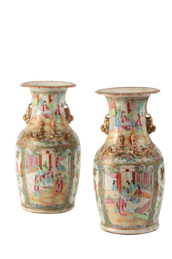 A PAIR OF CANTON FAMILLE ROSE BALUSTER VASES