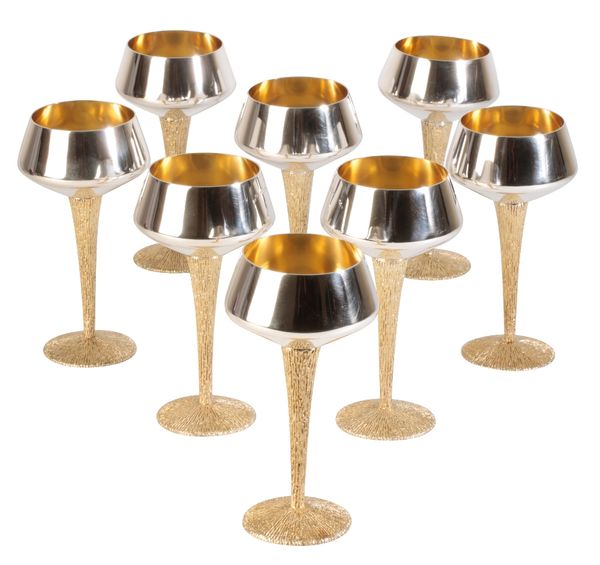 STUART DEVLIN (1931 - 2018): SET OF EIGHT MODERNIST SILVER PARCEL-GILT GOBLETS, London, 1969