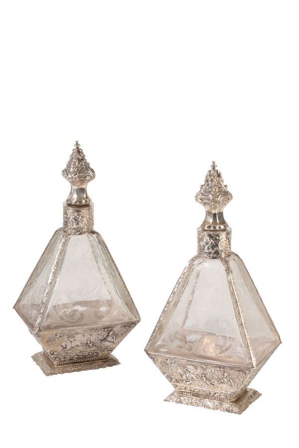 PAIR OF CONTINENTAL SILVER MOUNTED INTAGLIO GLASS PERFUME BOTTLES