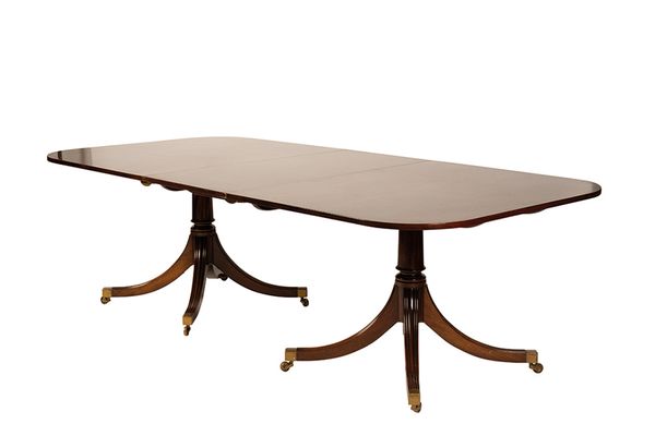 GEORGE III STYLE MAHOGANY TWIN PILLAR DINING TABLE