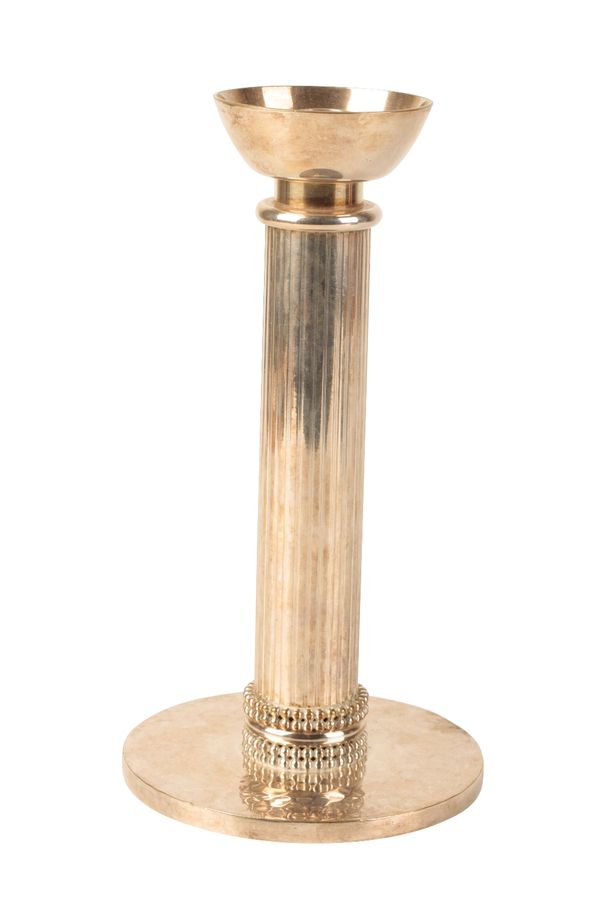 JEAN DESPRES: A SILVER PLATED CANDLESTICK