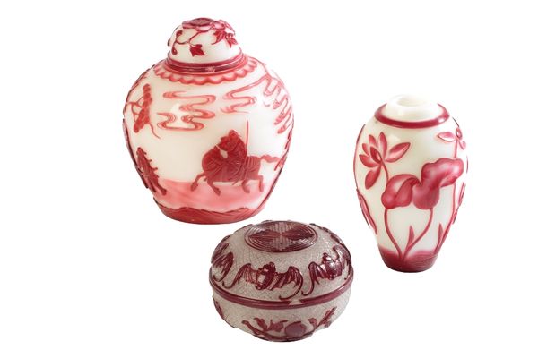 PEKING GLASS RED OVERLAY 'LOTUS' VASE AND COVER