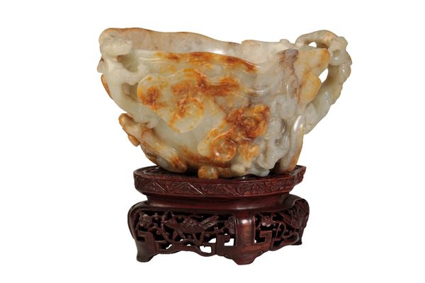 RARE CARVED CELADON AND RUSSET JADE LIBATION CUP