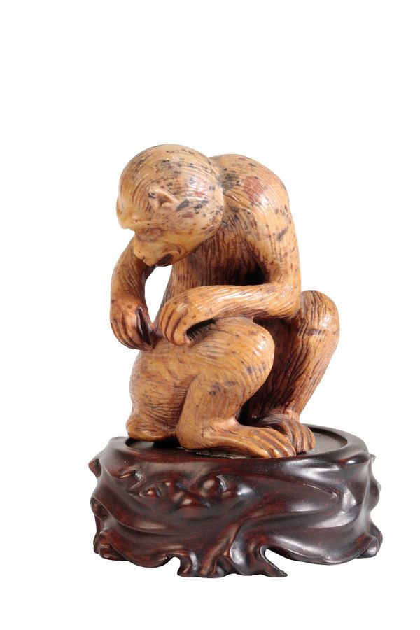 CARVED SOAPSTONE FIGURE OF A MONKEY