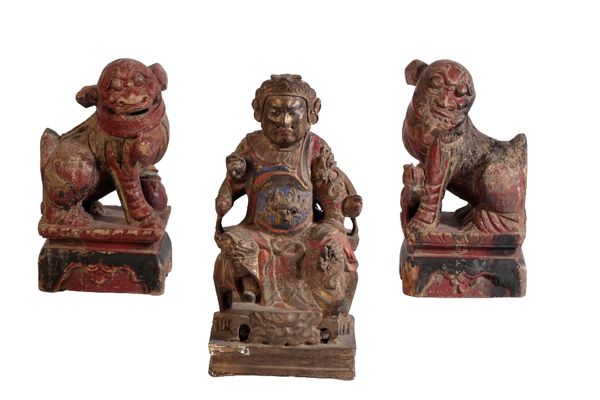 PAIR OF CARVED WOOD AND POLYCHROMZE PAINTED FU LIONS