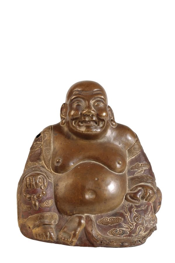 GILT COPPER ALLOY FIGURE OF A LAUGHING BUDDHA