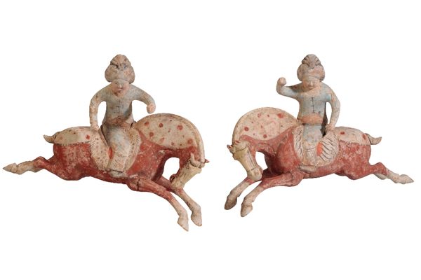 PAIR OF PAINTED POTTERY FIGURES OF POLO PLAYERS