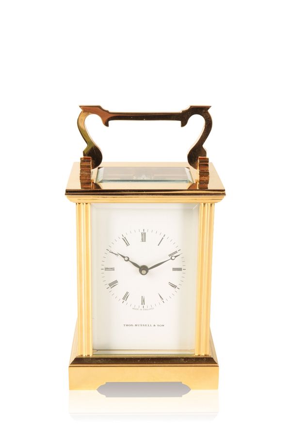 THOS. RUSSELL & SON: BRASS AND BEVELLED GLASS CARRIAGE CLOCK