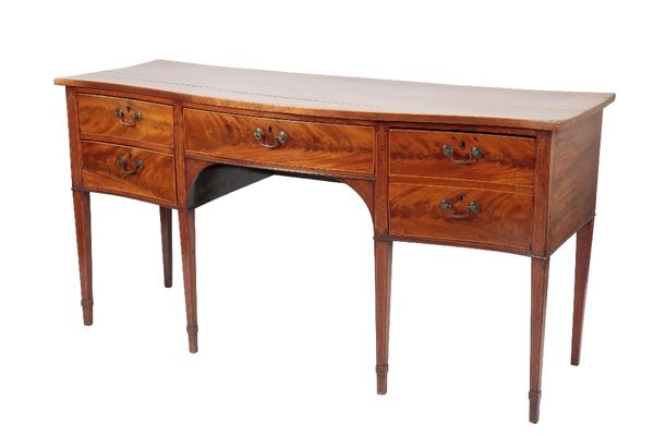 GEORGE III SHERATON STYLE FLAME-MAHOGANY SERPENTINE SIDEBOARD