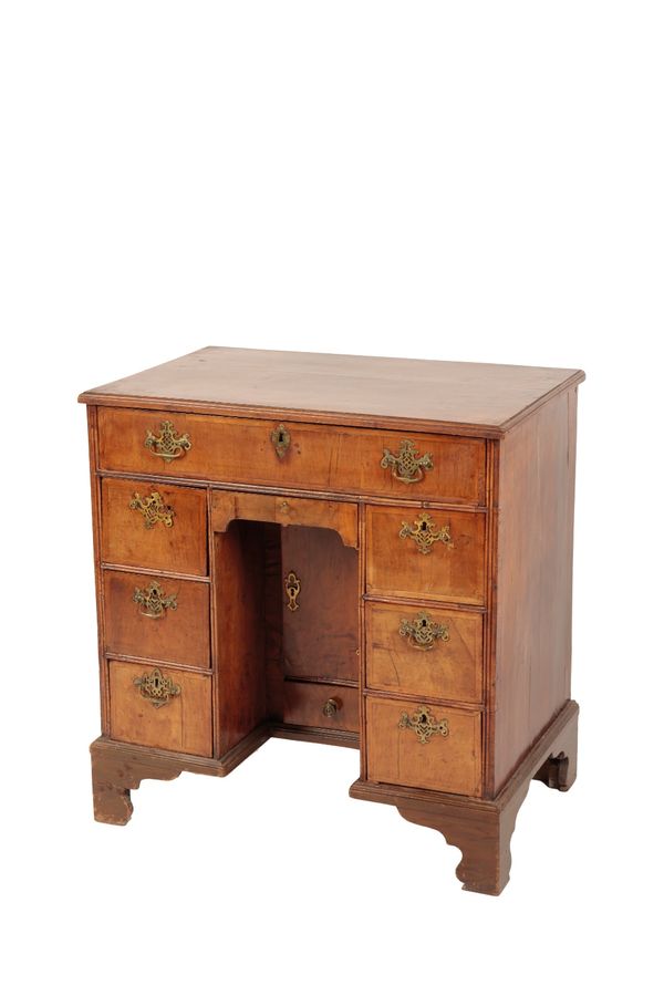 GEORGE I WALNUT AND FEATHERBANDED KNEE HOLE DESK