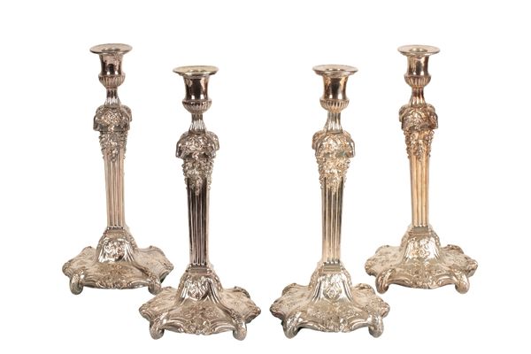 SET OF FOUR ADAM STYLE SILVER PLATED CANDLESTICKS