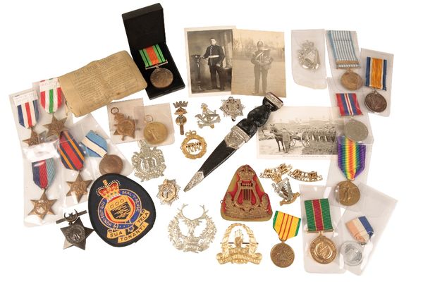 A COLLECTION OF CAP BADGES & MEDALS