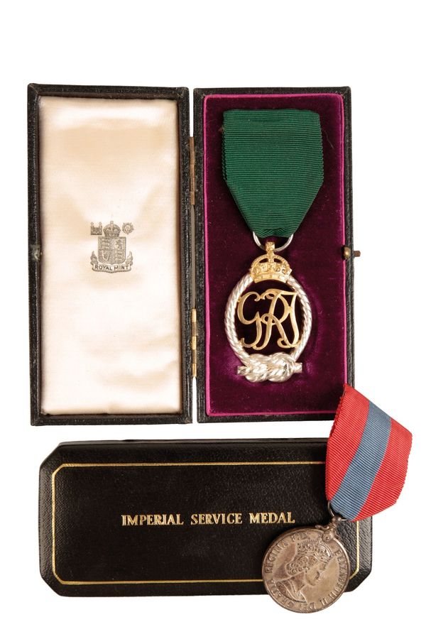 ROYAL NAVAL RESERVE OFFICERS DECORATION AND IMPERIAL SERVICE MEDAL TO JOHN EDWIN RUSBRIDGE