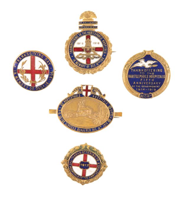 A COLLECTION OF FIVE ENAMEL BADGES COMMEMORATING THE BOMBARDMENT OF HARTLEPOOL DURING THE GREAT WAR