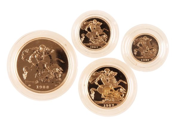 SET OF ELIZABETH II GOLD COMMEMORATIVE COINS