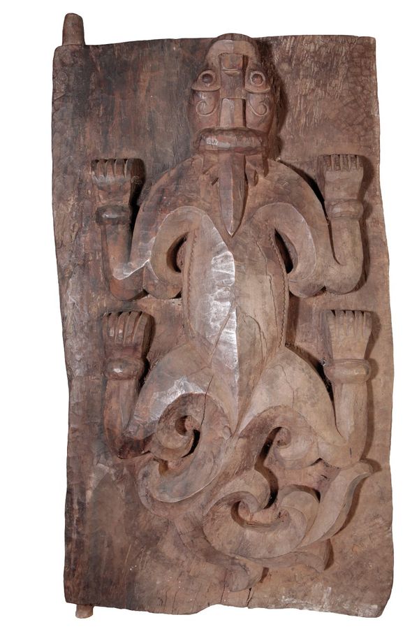 A CARVED WOOD SUMATRA GRANARY DOOR