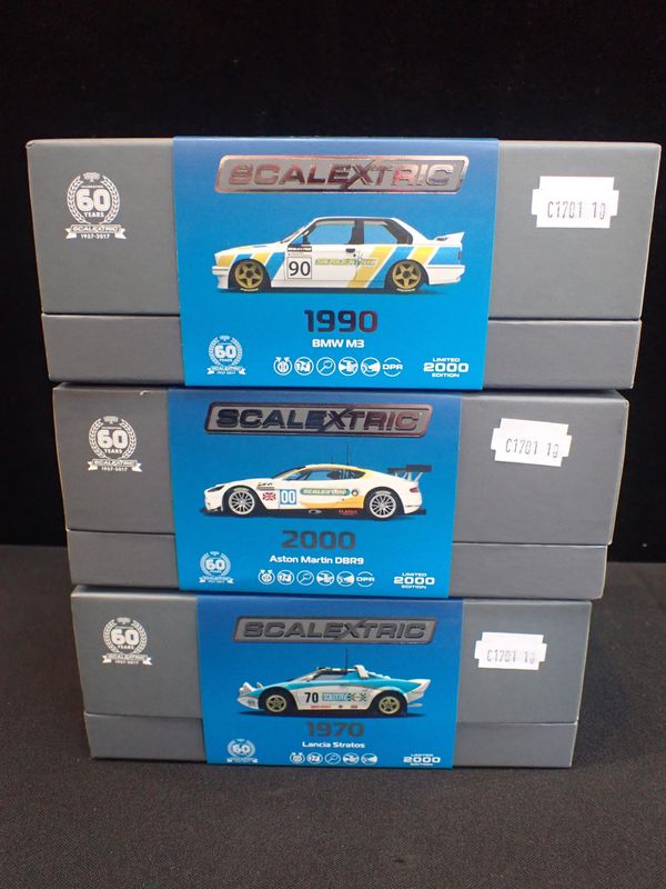 THREE BOXED SCALEXTRIC CARS 'CELEBRATING 60 YEARS'