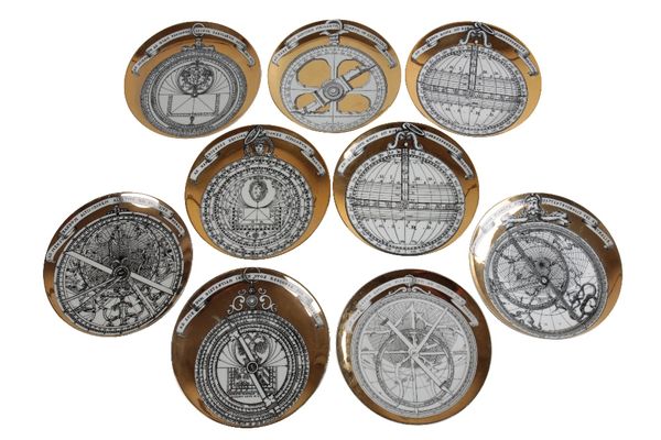 •PIERO FORNASETTI: A COLLECTION OF NINE "ASTROLABIO" PLATES